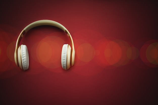 A top view of a white headphones. online music player app.