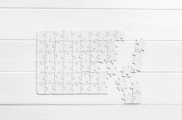 Top view of white jigsaw puzzle