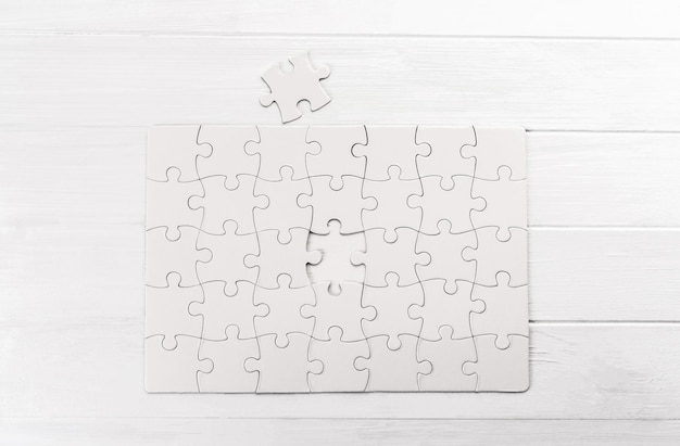 Top view of white jigsaw puzzle