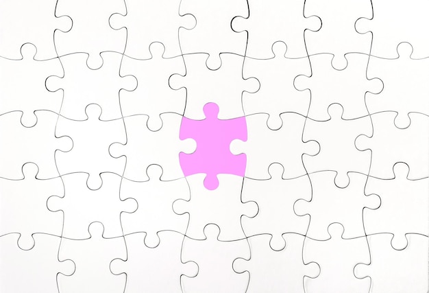 Photo top view of white jigsaw puzzle