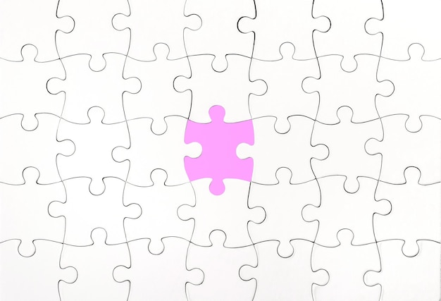 Top view of white jigsaw puzzle