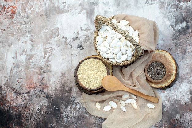 top view white seeds with raw rice on white background nut photo peanut cips plant kitchen