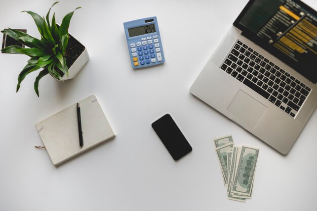 A top view of the white table in office workplace, modern minimalism style