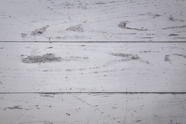 Top view of the white wooden table surface background.