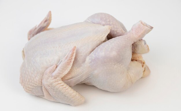 Top view Whole fresh raw chicken isolated on white background