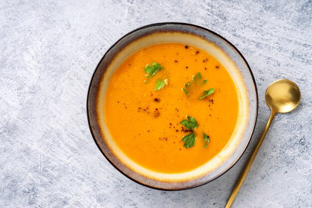 Top view of winter spicy lentil cream soup