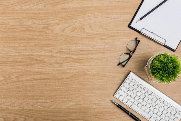 Top view Wood office desk table. Flat lay Workspace