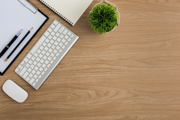 Top view Wood office desk table. Flat lay Workspace