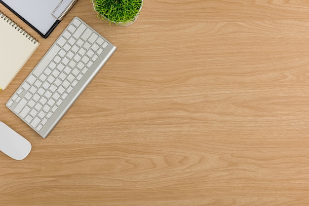 Photo top view wood office desk table. flat lay workspace