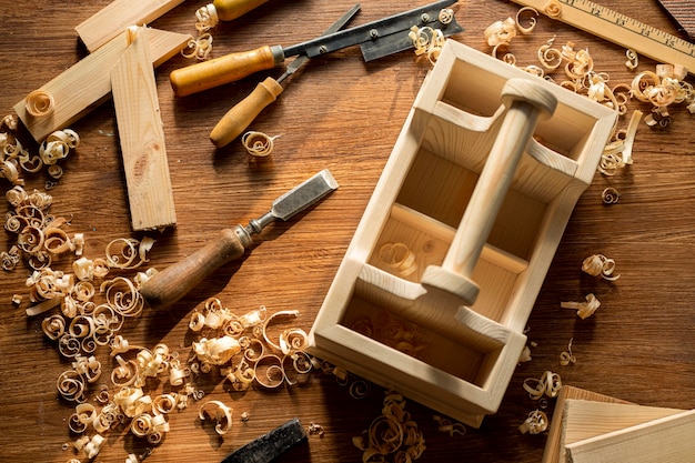 Top view wooden box and wood sawdust in workshop