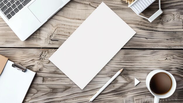 Photo top view of a wooden desk with a blank sheet of paper a pencil a cup of coffee a laptop a clipboard and a decorative plant