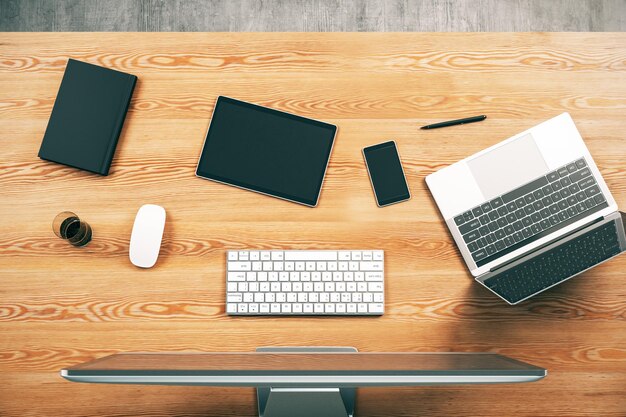 Top view of wooden desk with computer laptop and other working accessories Workplace concept 3D Rendering