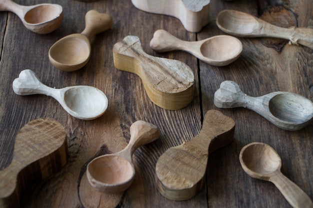 Top view wooden spoons on table