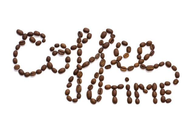 Photo top view of word coffee time made from coffee beans isolated on white background. good morning.