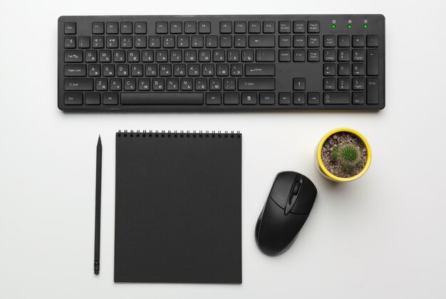 top view work space of an office worker with computer keyboard