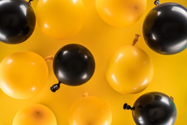 Top view yellow black balloons