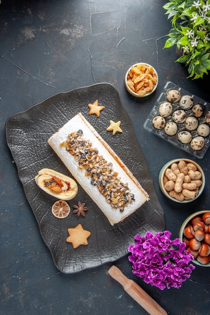 top view yummy biscuit roll with nuts. pie cookie cake tea sugar dough sweet fruit flower