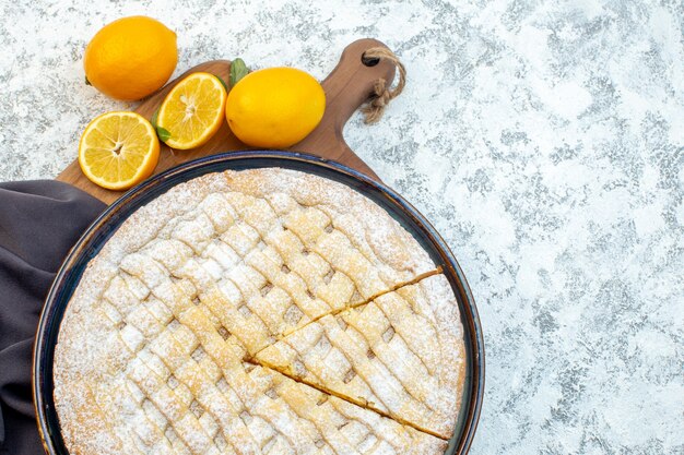 top view yummy lemon pie sugar powdered inside pan on white background biscuit pastry sugar cookie tea cake dessert