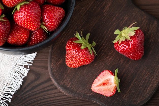 Topdown shot of ripe strawberry on black table