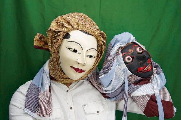 Topeng is a traditional mask originating from indonesia