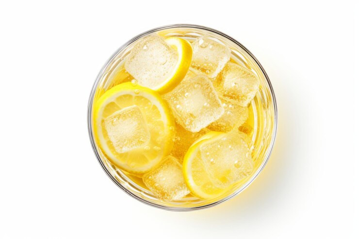 TopView Refreshment Captivating Glass of Sparkling Water or Lemon Soda on White Background