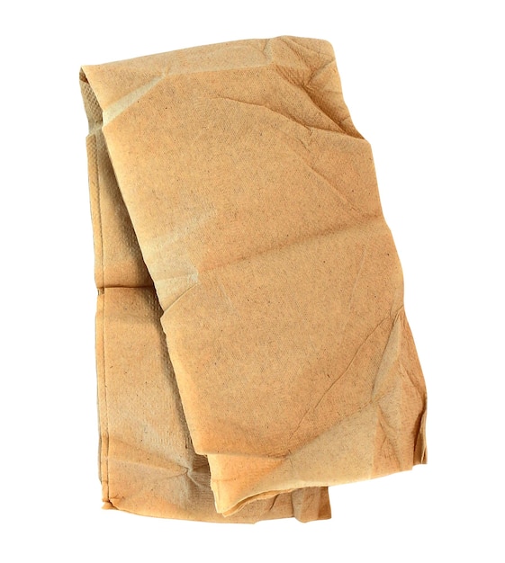 Torn brown tissue paper isolated on white background