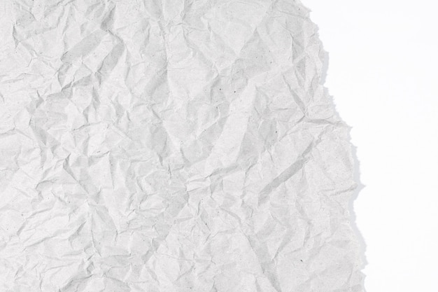 Фото Разорванный серый цвет мятой бумаги на белой текстуре картона. фон чистый лист бумаги с копией пространства для текста и графики