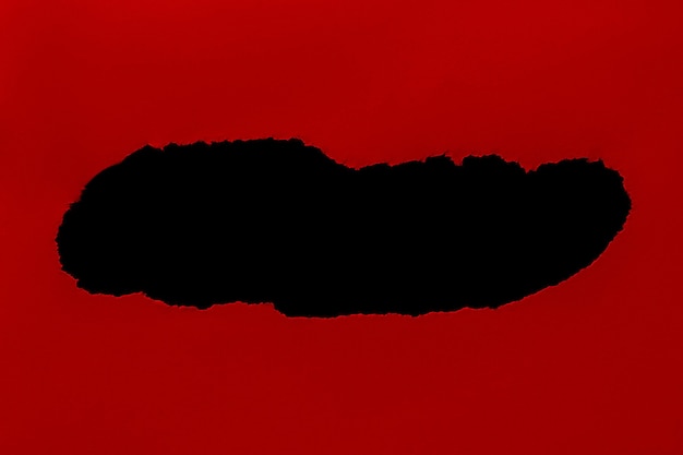 Torn paper in red and black with shadow Contrast isolated