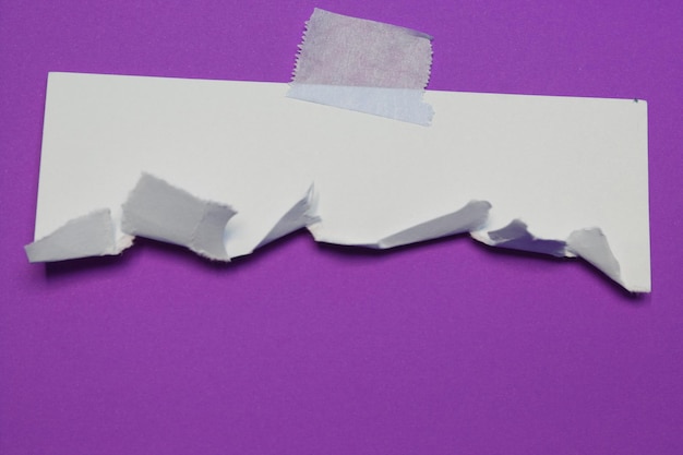 torn paper with adhesive tape space for your message