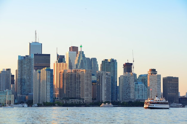 Toronto skyline with boat, urban architecture and blue sky