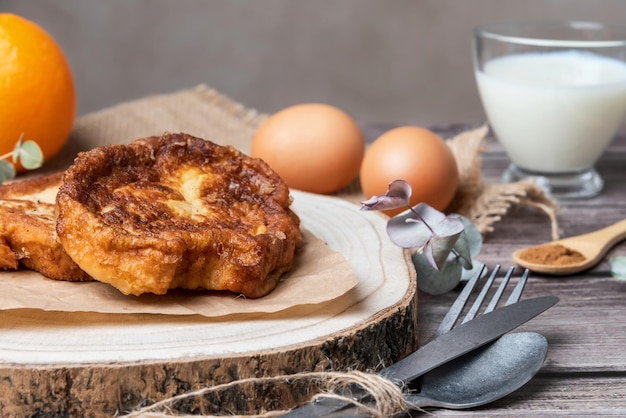 Torrijas Closeup of the typical Spanish sweet made of bread milk eggs sugar cinnamon and orange zest