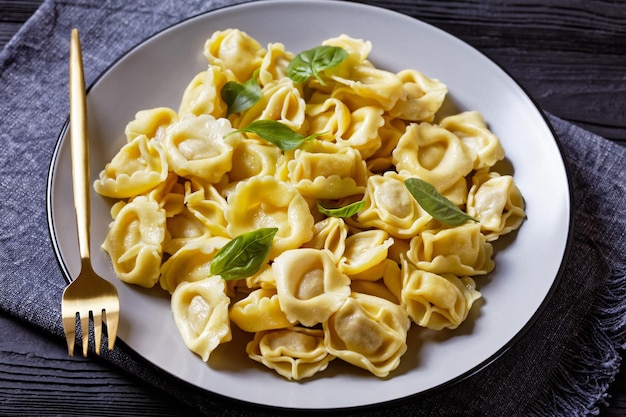 Tortelloni with cheese filling on a plate