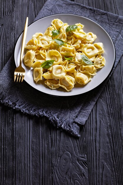 Tortelloni with cheese filling on a plate