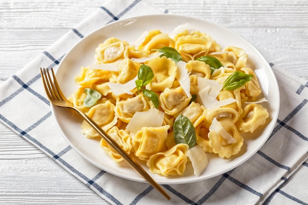 Tortelloni with cheese filling on a plate