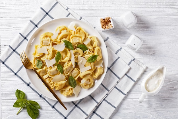 Tortelloni with cheese filling on a plate