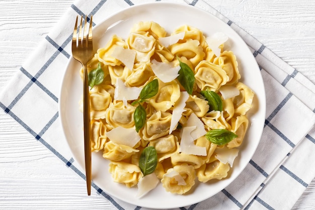 Tortelloni with cheese filling on a plate