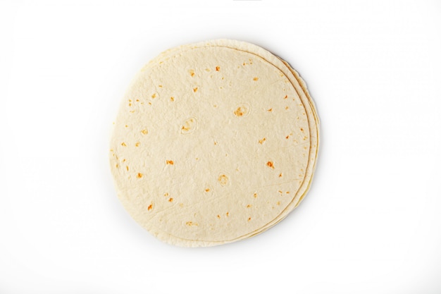 Foto tortilla la tortilla di mais o semplicemente la tortilla è un tipo di pane azzimo sottile fatto da hominy.