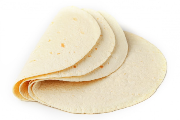 Photo tortilla . corn tortilla or simply tortilla is a type of thin unleavened bread made from hominy.