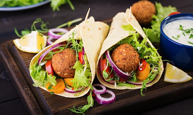 Tortilla wrap with falafel and fresh salad