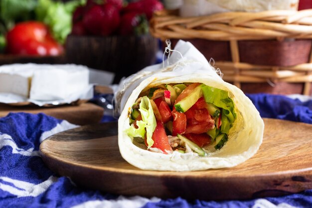 Tortilla wraps with roasted chicken and vegetables