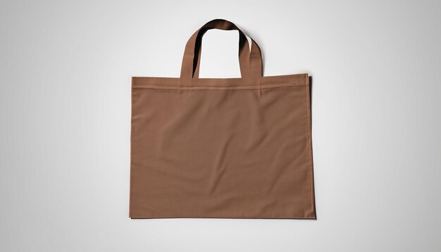 Photo tote bag fabric or cloth brown color shopping sack mockup isolated on white background