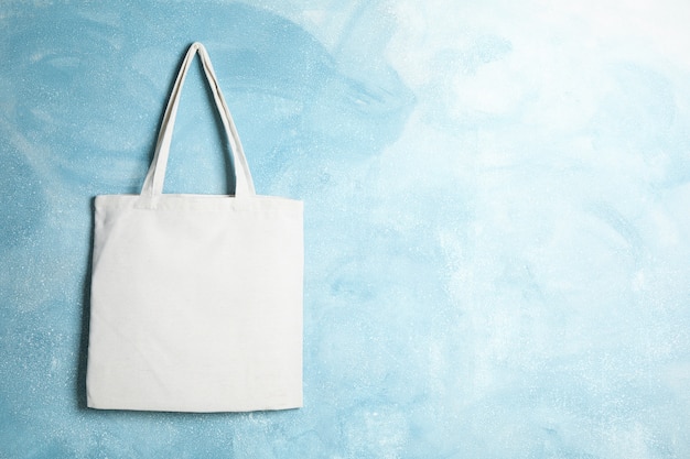 Tote cotton bag on color wall