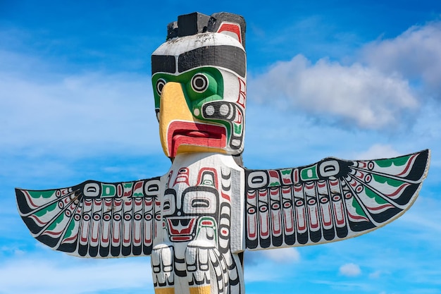 Totem wood pole in sky background