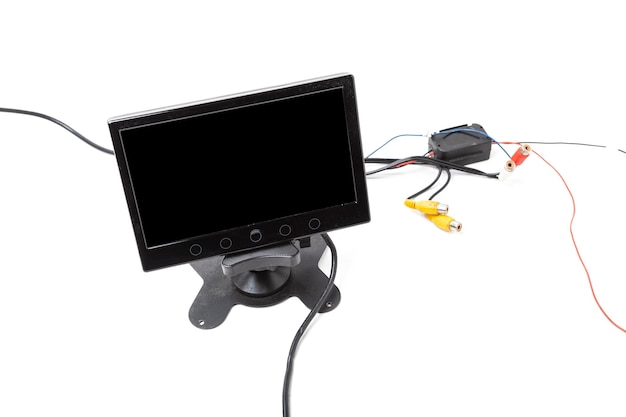 Photo touchscreen monitor for displaying navigation rear view camera and car multimedia on a white isolated background audio and video electronics for transport