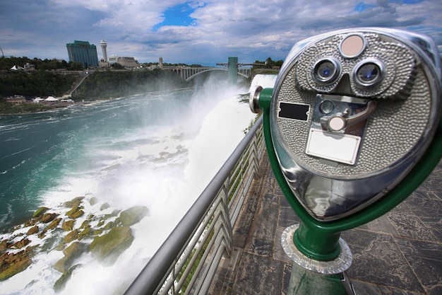 Tourist binocular viewer in Niagara Falls from New York State USA