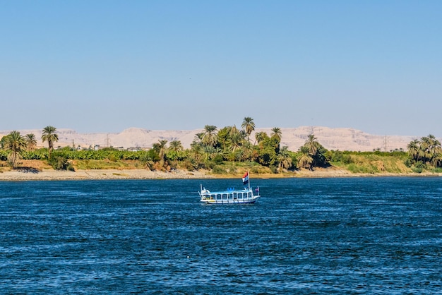 Tourist boat on the Nile river in Luxor Egypt