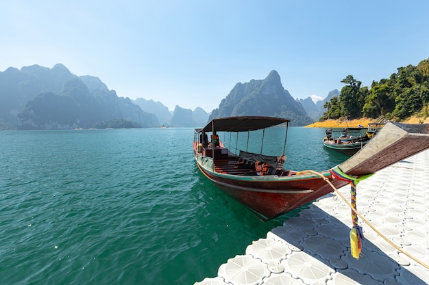 Tourist boat view with nature rock mountain island scenic landscape Khao Sok National park in thailand. amazing thailand.