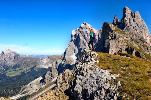 Tourist girl at the Dolomites