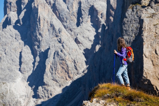 Tourist girl at the Dolomites