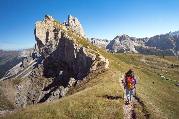 Tourist girl at the Dolomites